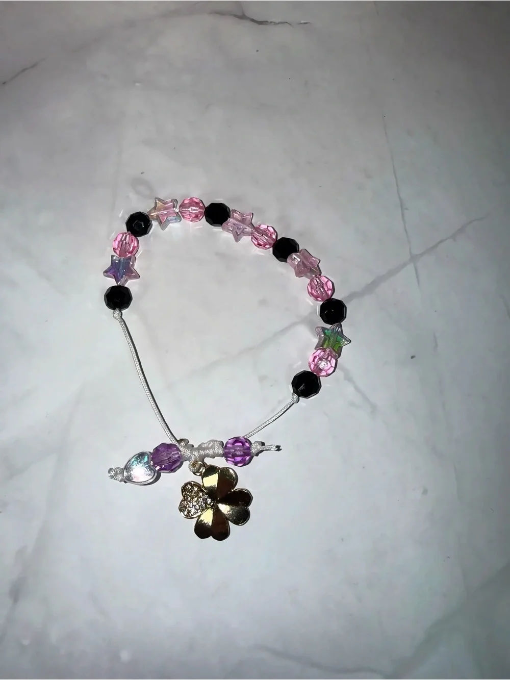 Pink & Black Star Bead bracelet with Gold Flower Charm